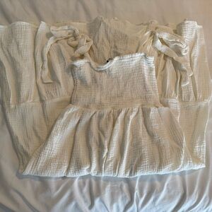 White Sleeveless Dress with Ruffle Details